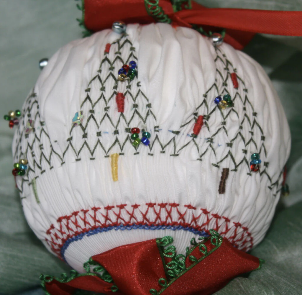 8” Hand Smocked ball with Christmas Trees ribbons and beads