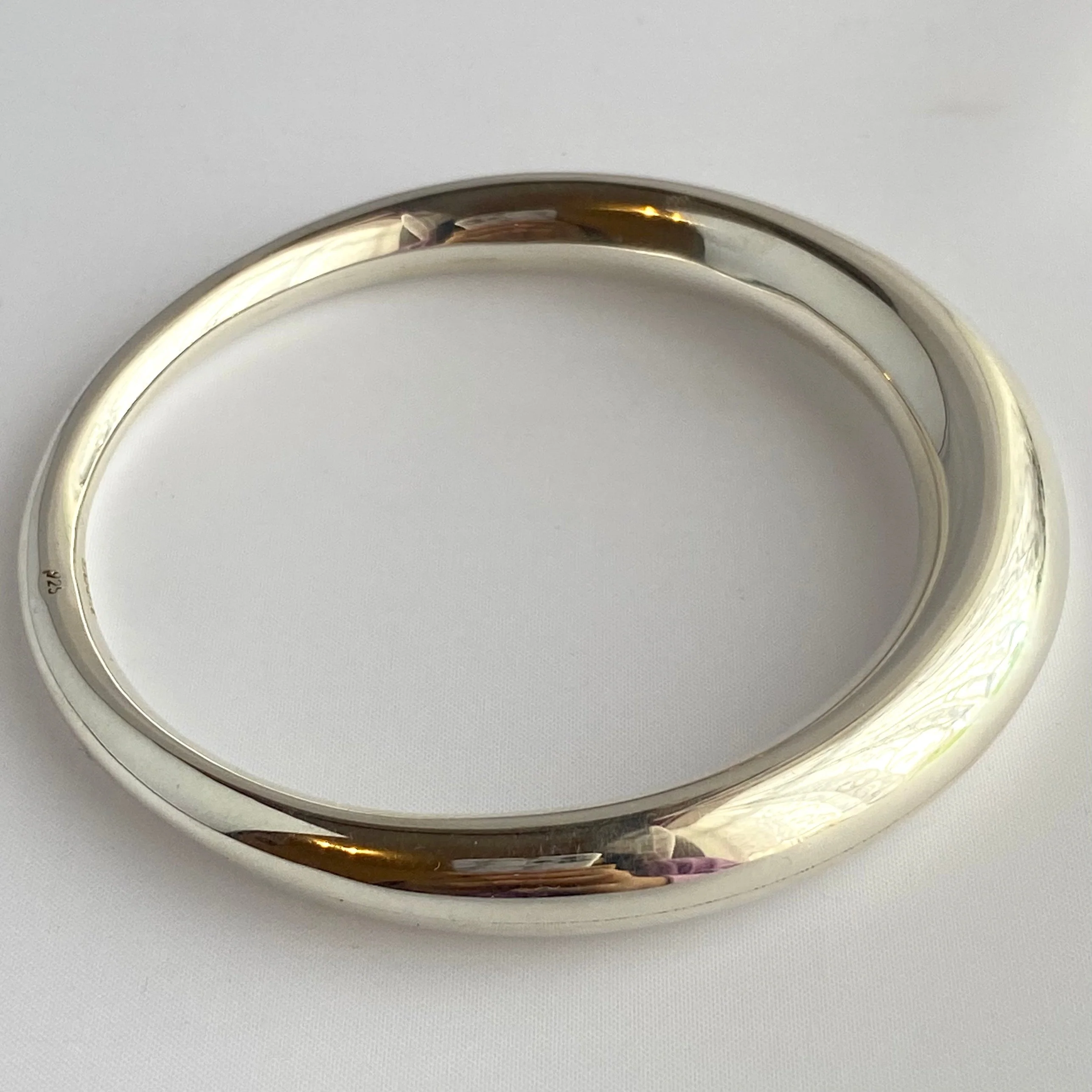 Chunky Silver Round Bangle with a Graduated Tapered Design - Image 6