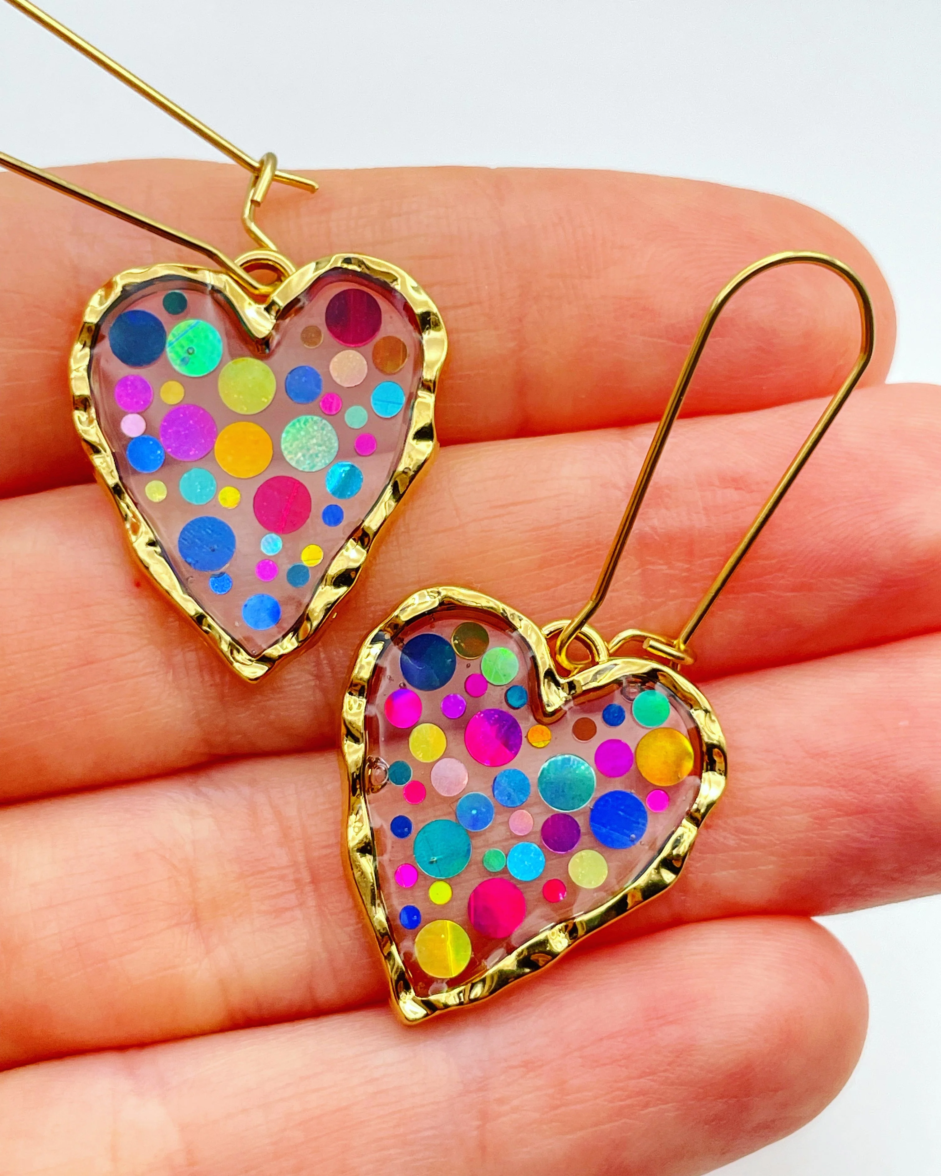 Disco heart earrings with colourful sparkles