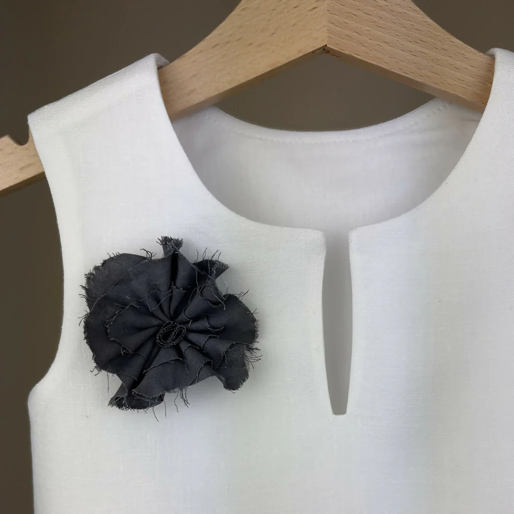 Girls Linen Blouse with Black Flower Detail - Image 2