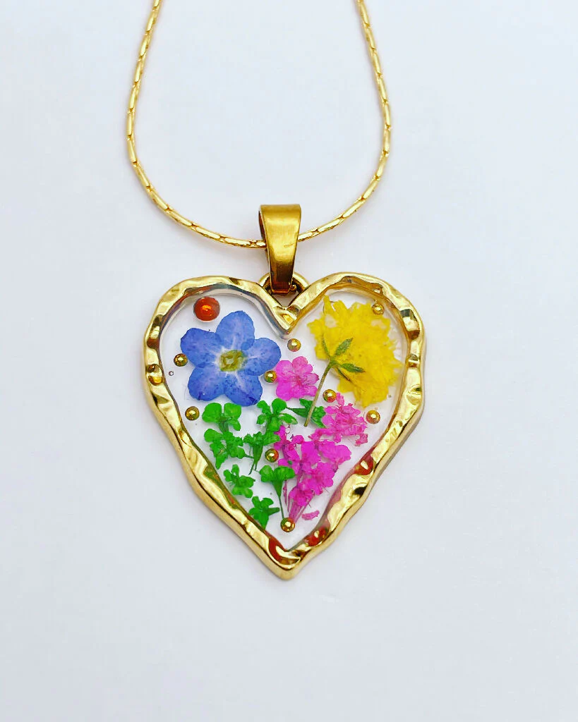 Heart necklace with forget-me-not flowers