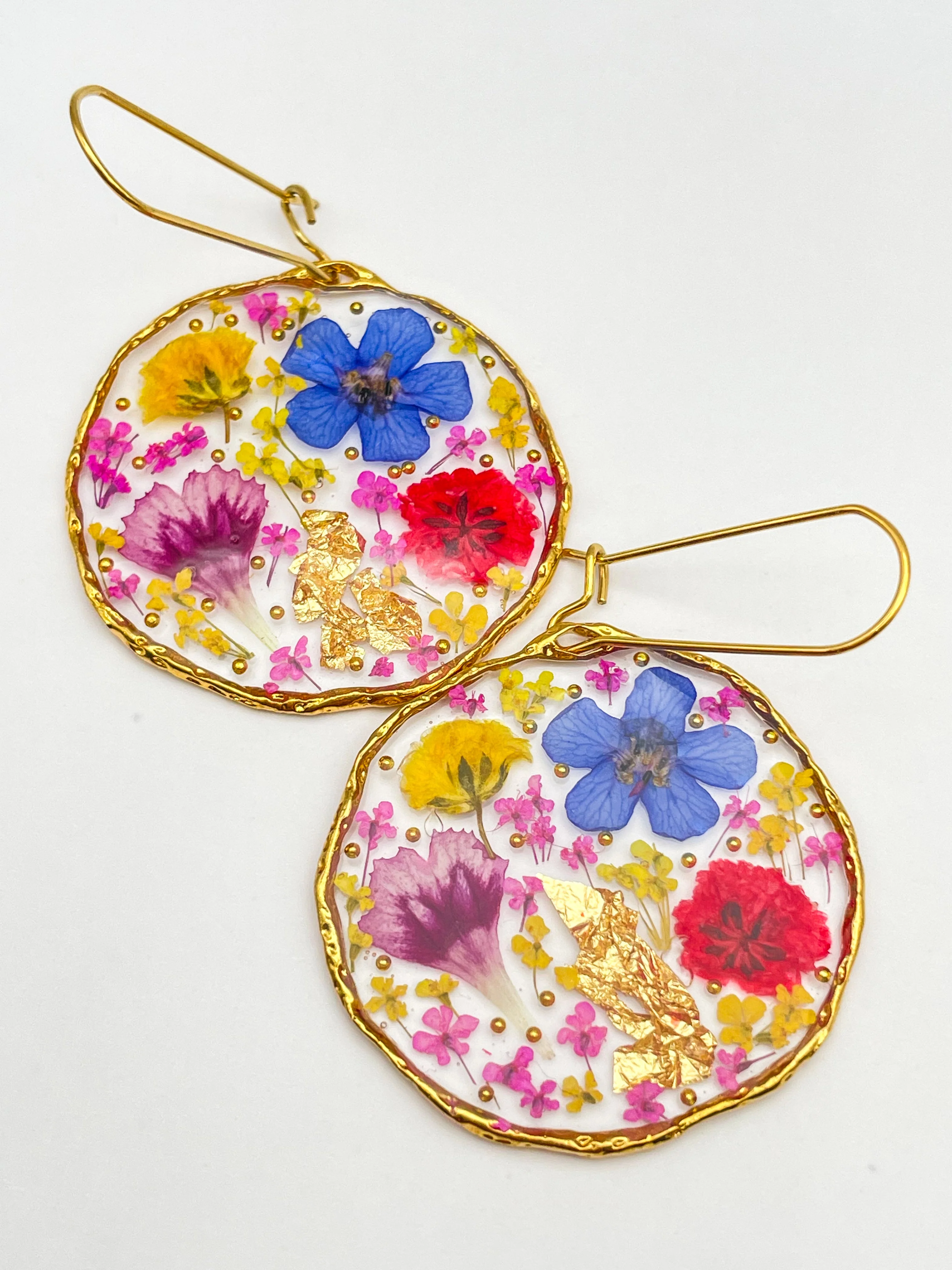 Statement earrings with colourful flowers