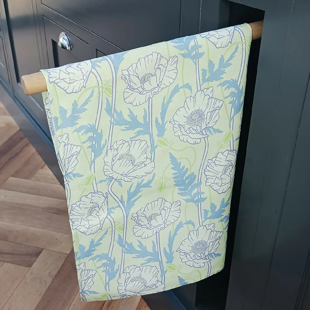 Poppy pattern tea towel in pale green/ blue - Image 2