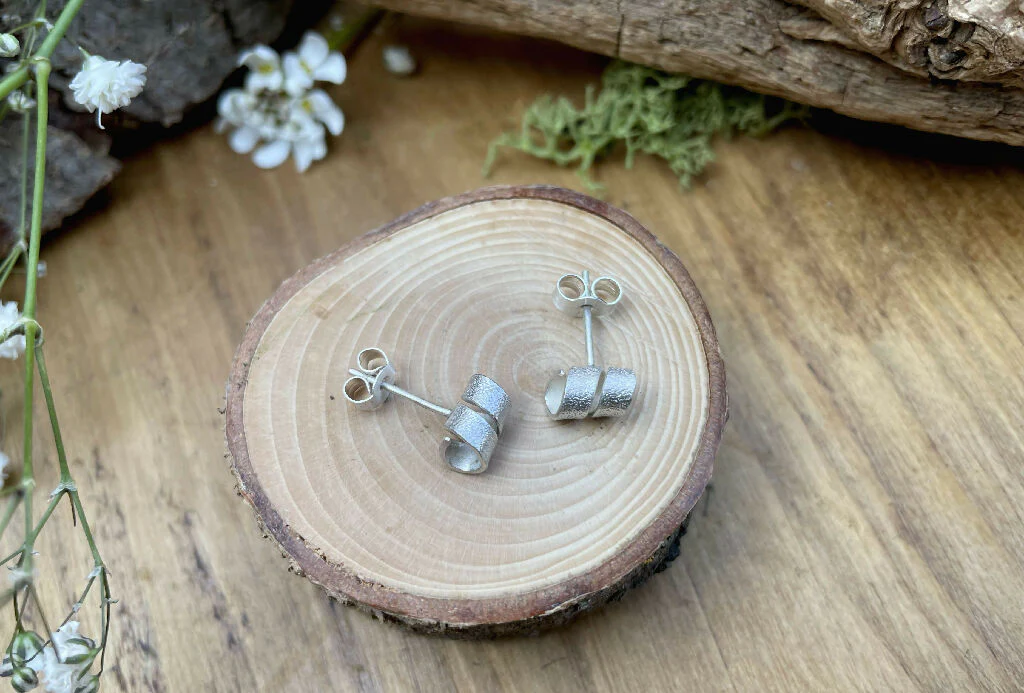 Silver Petal Twist Stud Earrings - Image 2
