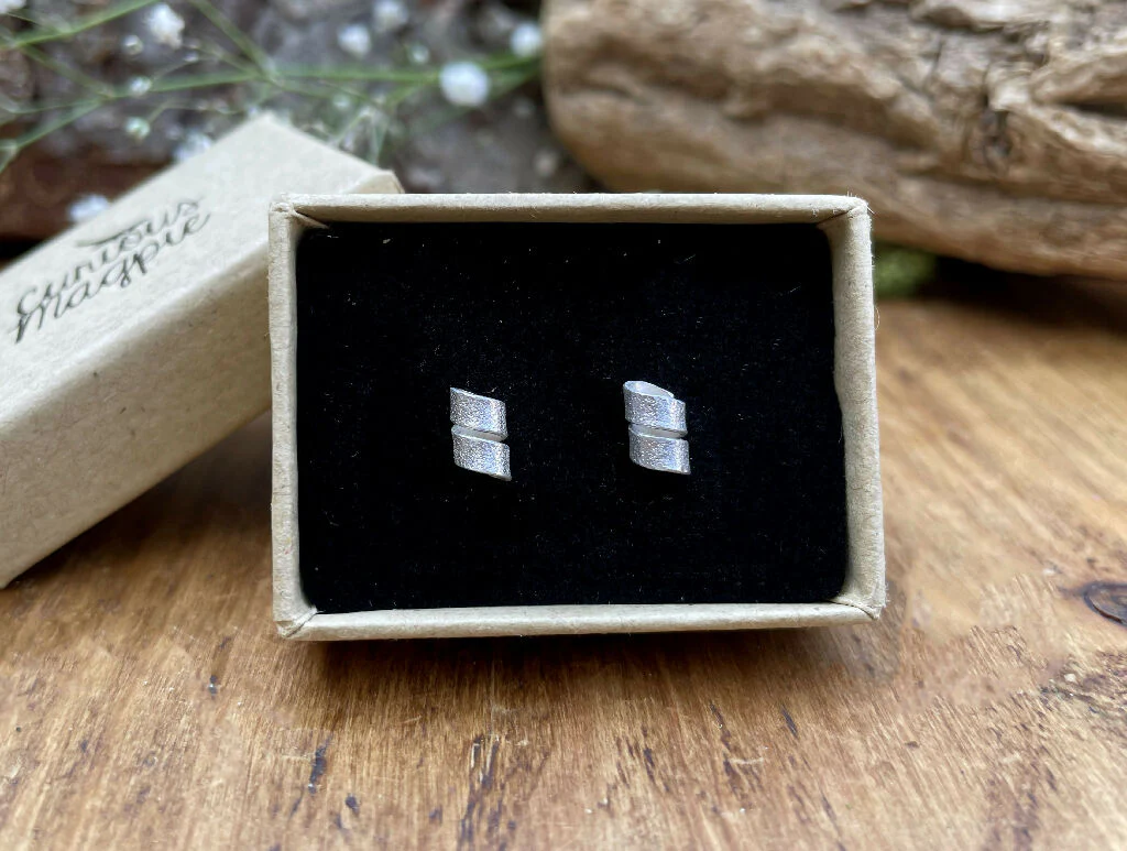 Silver Petal Twist Stud Earrings - Image 3