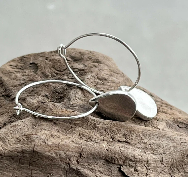 A pair of Silver Devon Raindrop Earrings