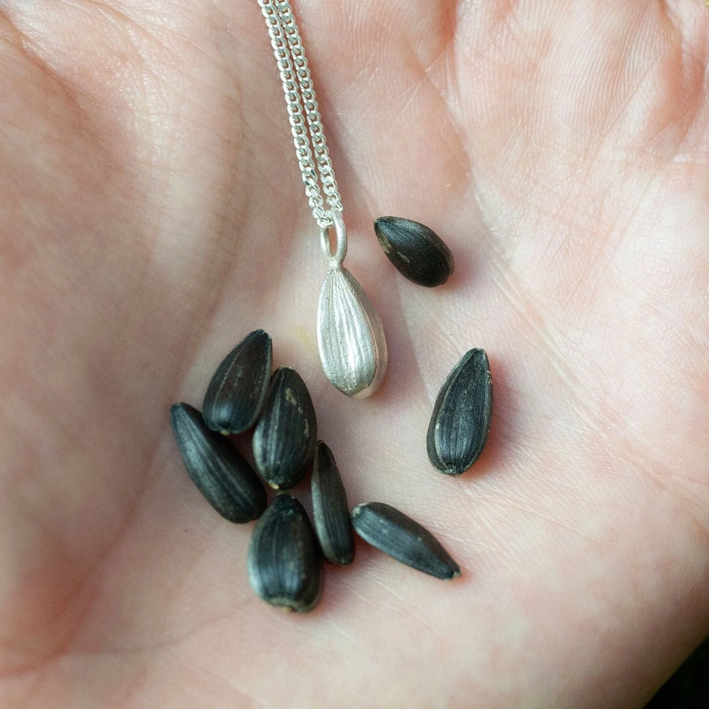 Silver Sunflower Seed Pendant - Image 2