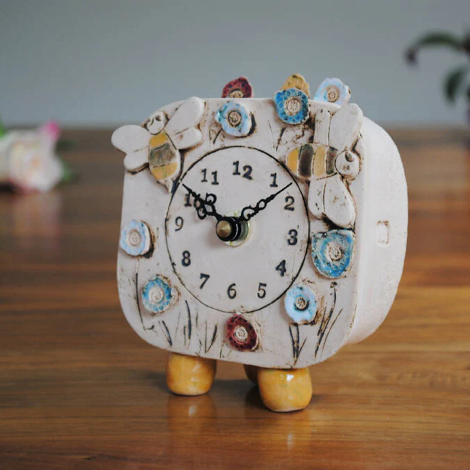 Small Handmade Clock with Pebble Feet in Bumble Bees and Meadow Design - Image 3