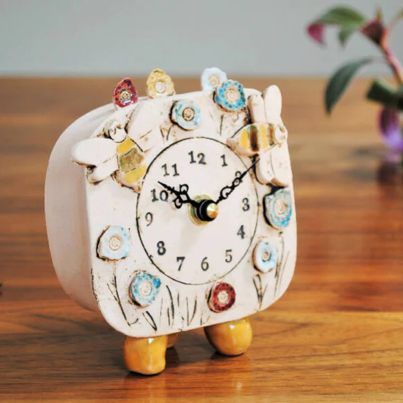 Small Handmade Clock with Pebble Feet in Bumble Bees and Meadow Design - Image 4