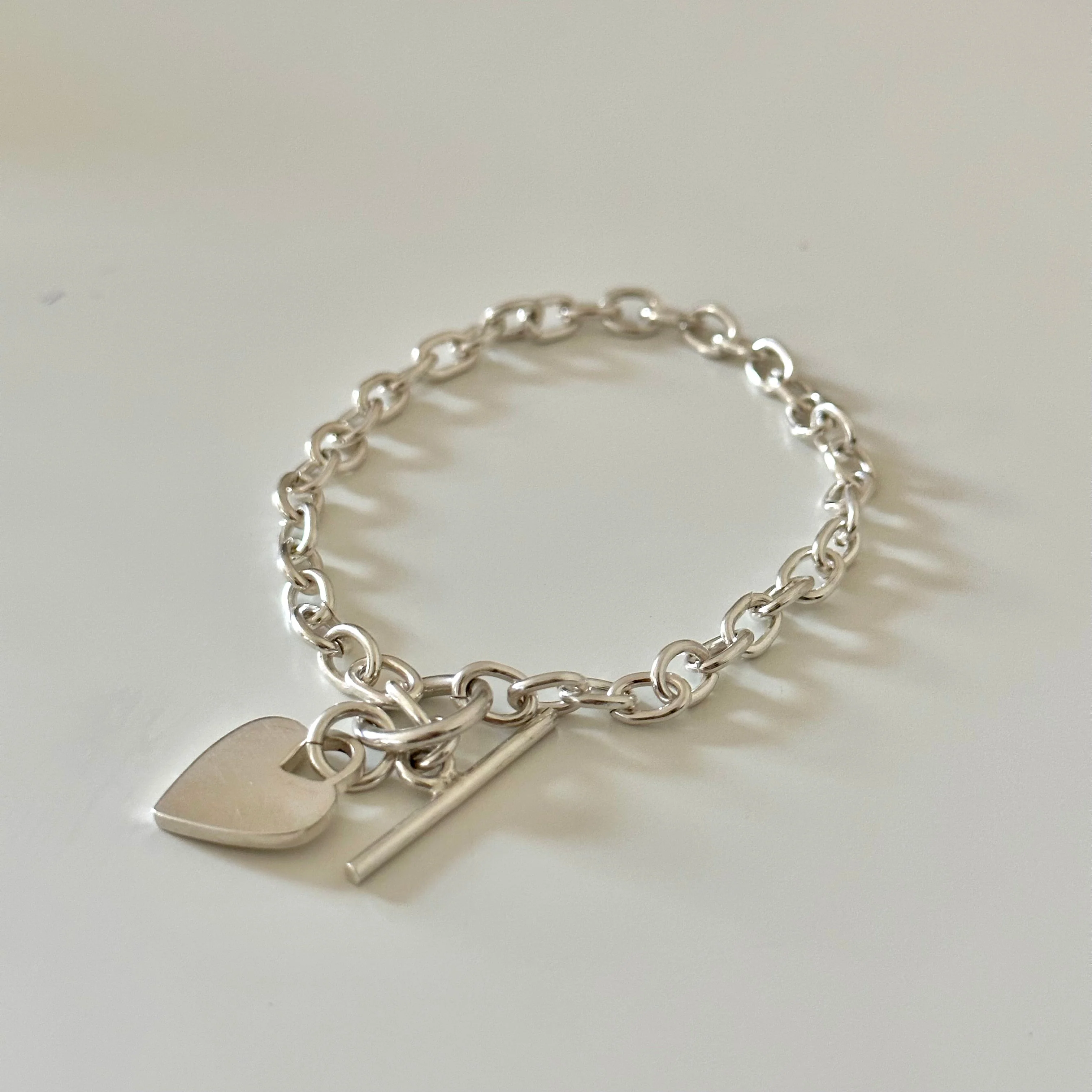 Sterling Silver Bracelet with Fine Oval Links and a Heart Charm - Image 2