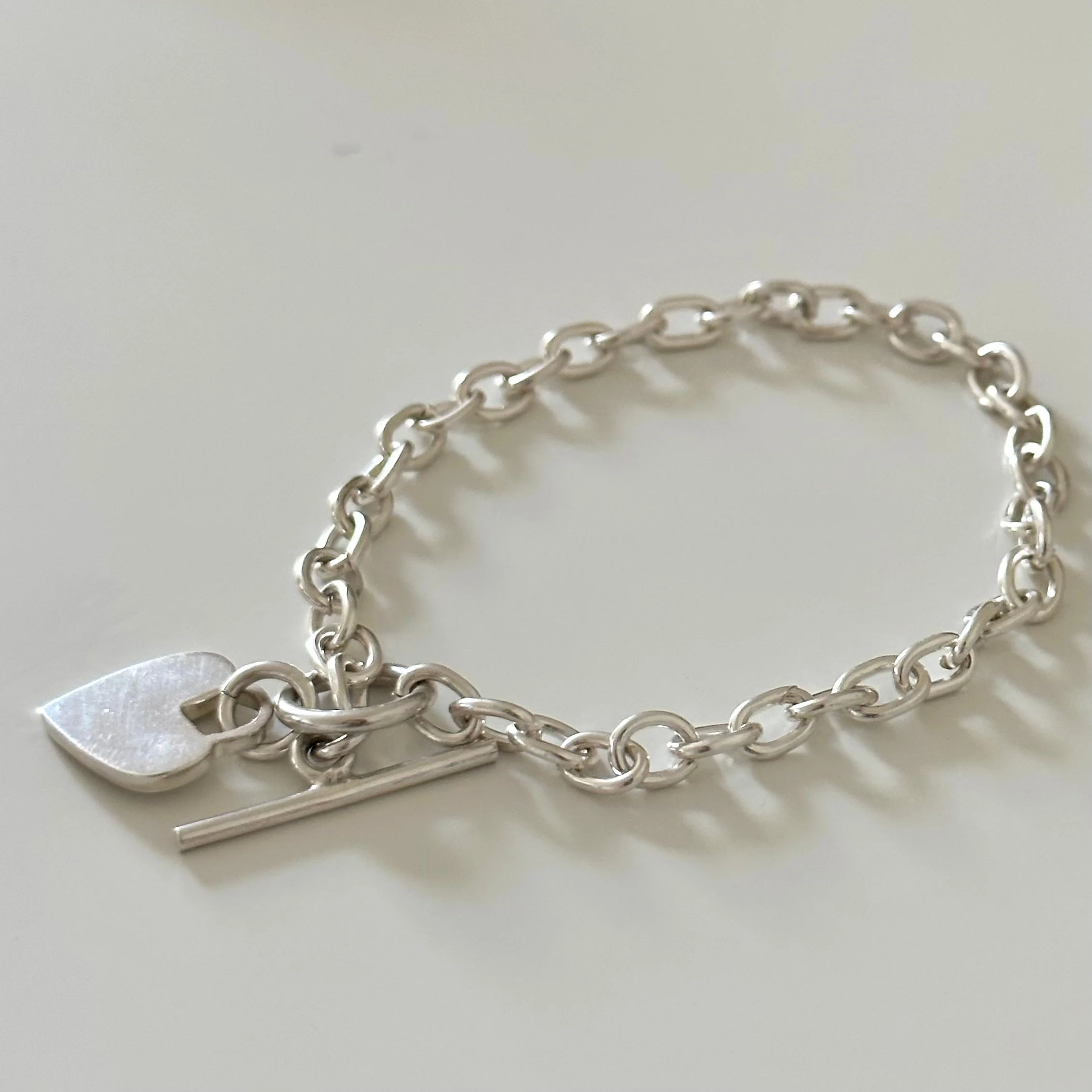 Sterling Silver Bracelet with Fine Oval Links and a Heart Charm - Image 4