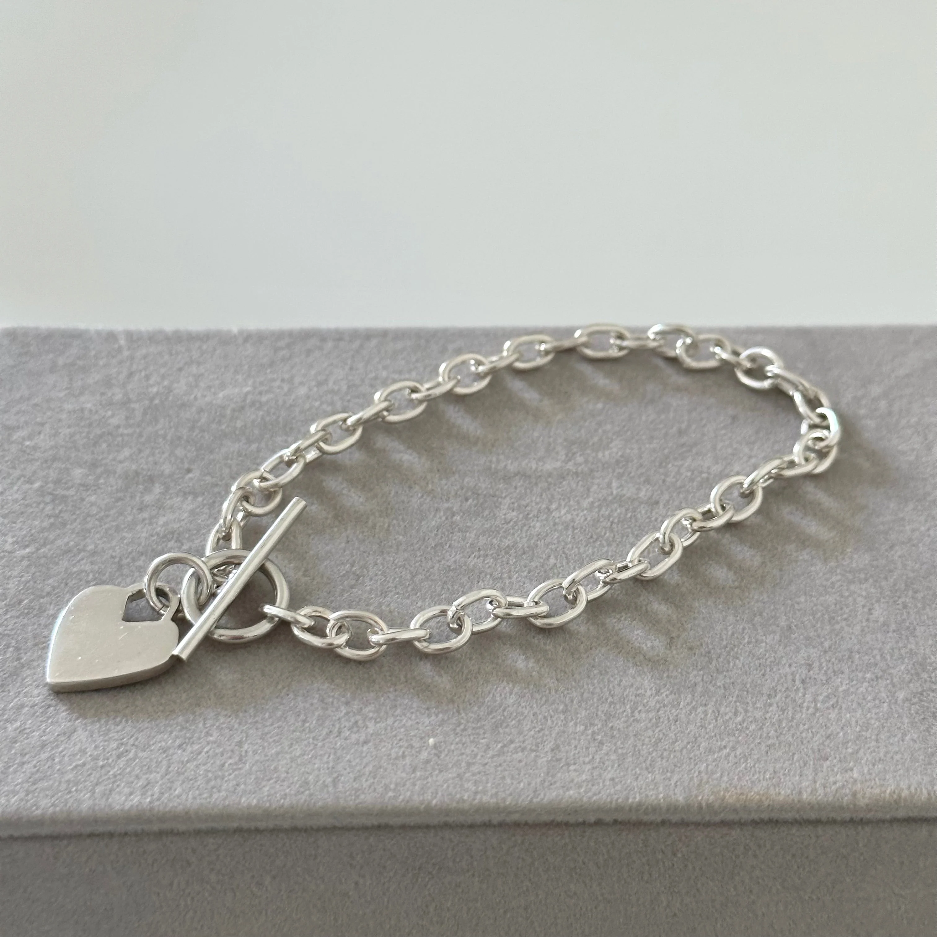 Sterling Silver Bracelet with Fine Oval Links and a Heart Charm - Image 6