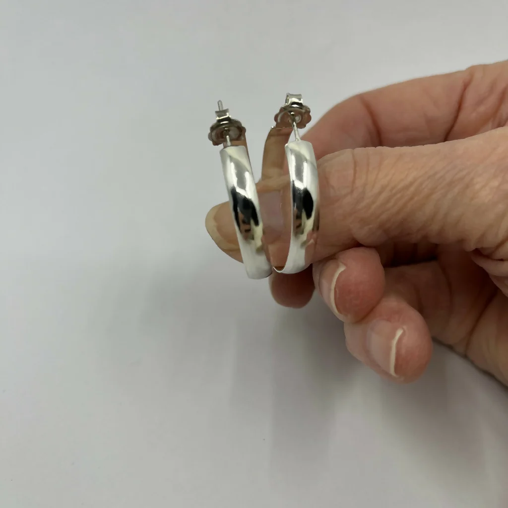 Sterling silver chunky hoop earrings with a polished finish - Image 3
