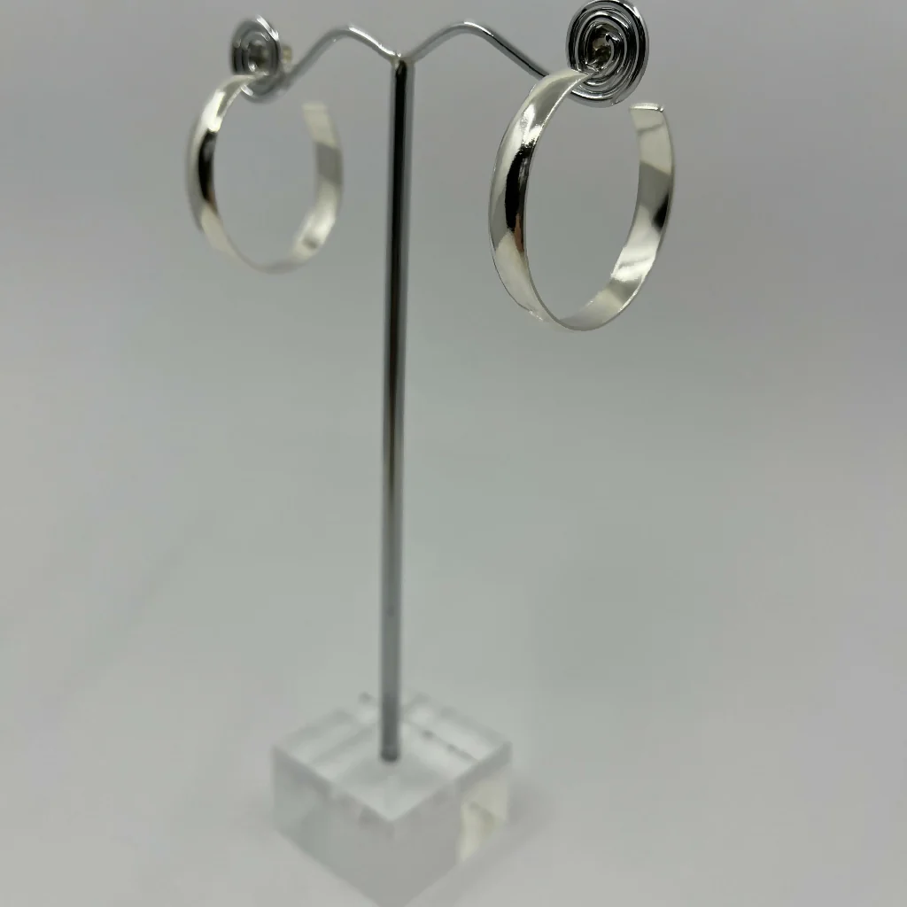 Sterling silver chunky hoop earrings with a polished finish - Image 4