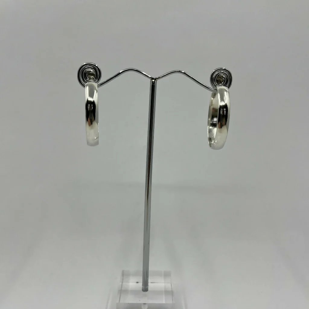 Sterling silver chunky hoop earrings with a polished finish - Image 5
