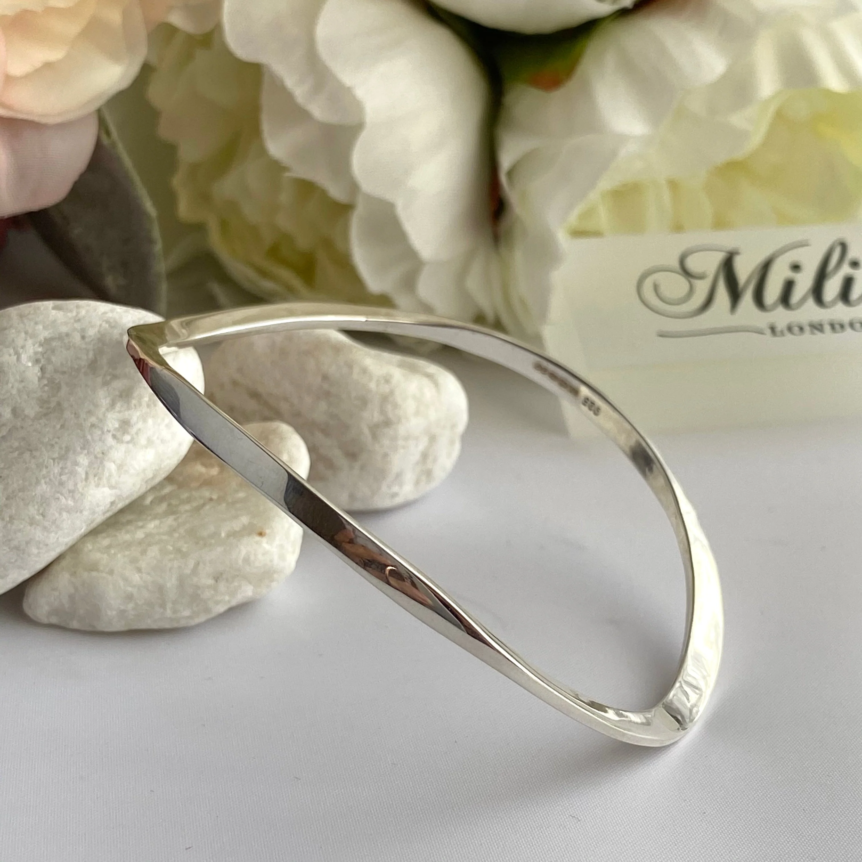 Sterling Silver Wavy Bangle with a Slightly Triangular Shape - Image 5