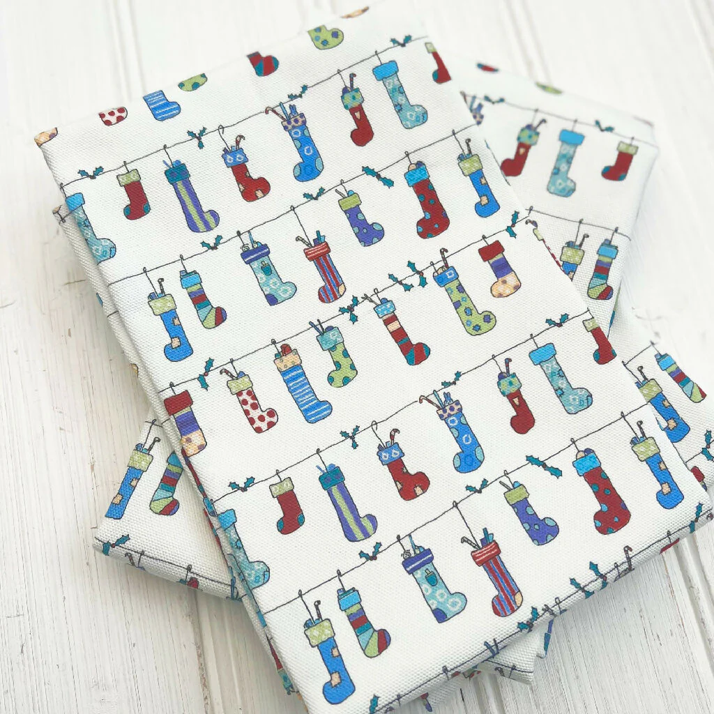 'Stockings' Christmas Organic Cotton Tea Towel - Image 3