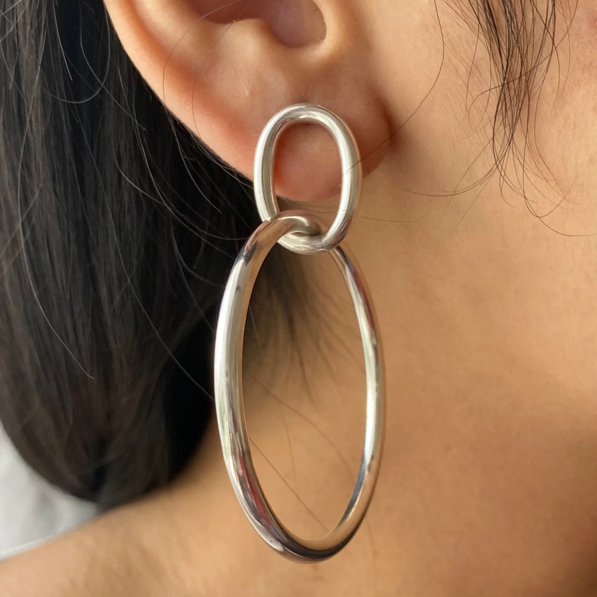 Two Interlinked Sterling Silver Hoop Earrings